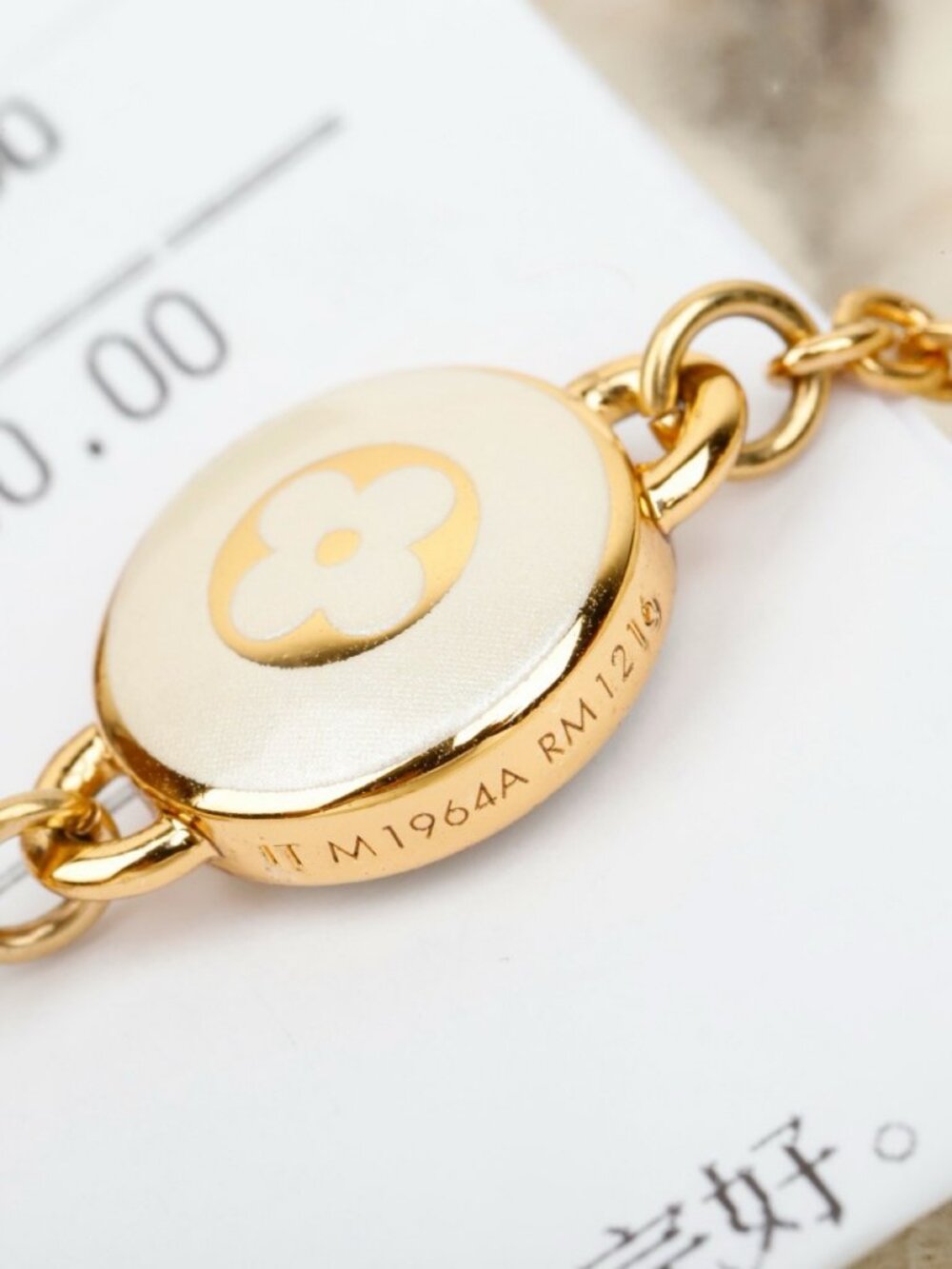 Louis Vuitton Gold-Tone White Enamel Monogram Coin Bracelet